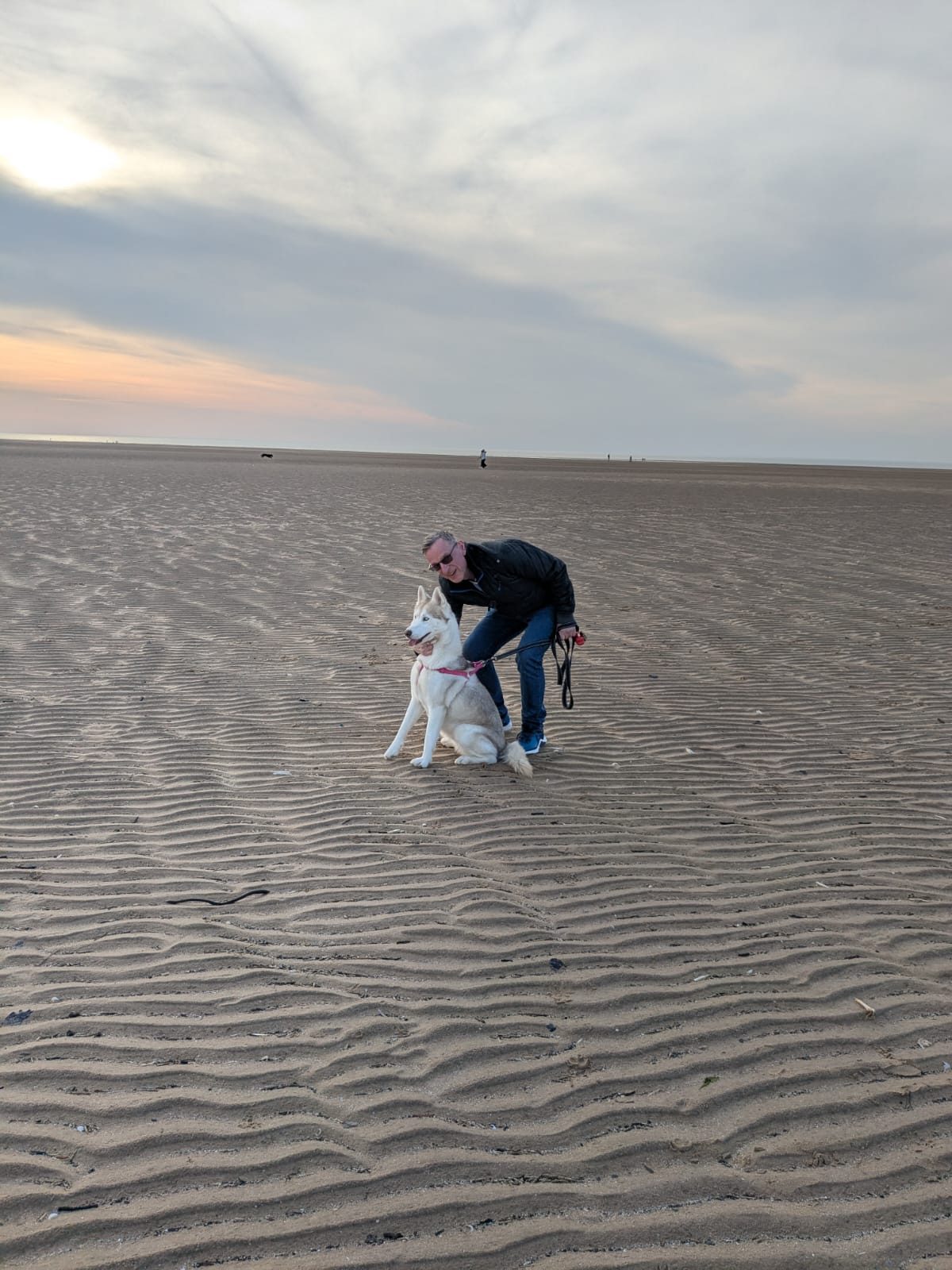 Wide sandy beach at sunset